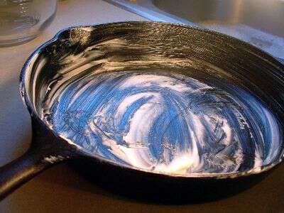 Making cornbread in a cast iron pan