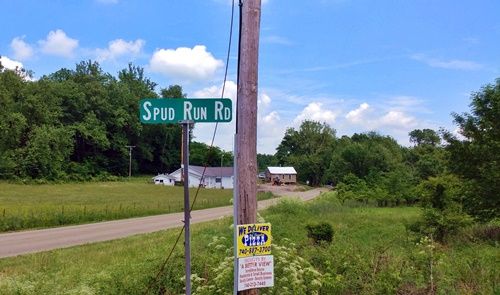 Spud-Run-Road sign