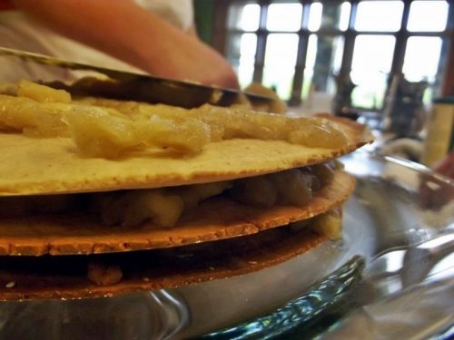 apple stack cake being assembled