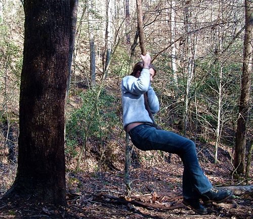 girl swinging on grapevine