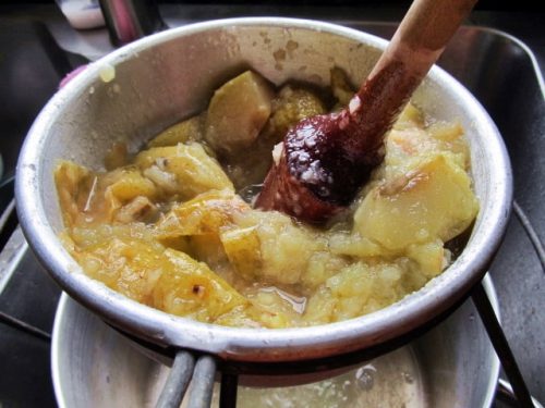 apples being processed for applesauce