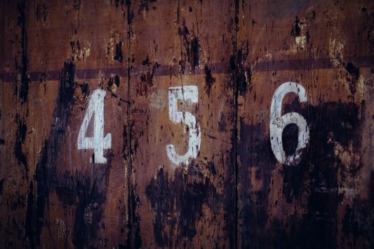 wooden board with the numbers 4 5 and 6