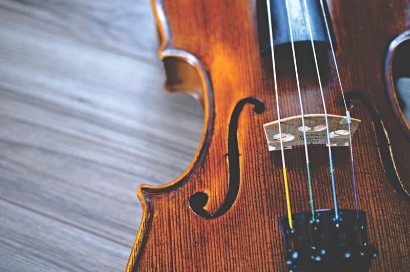 fiddle laying on floor