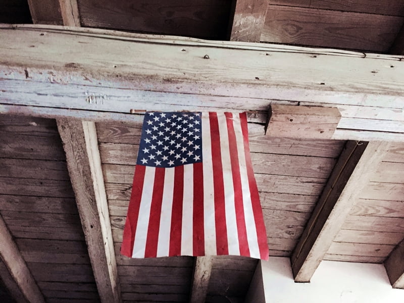 usa flag hanging in barn