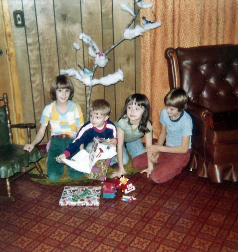 children around homemade tree