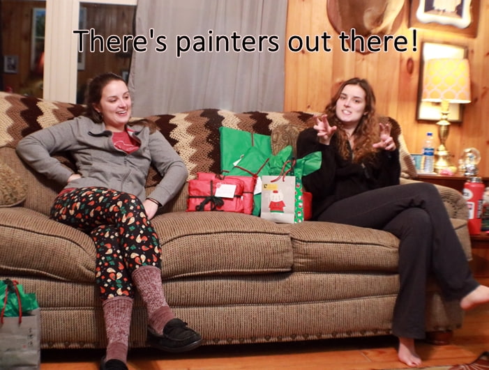 two girls sitting on couch