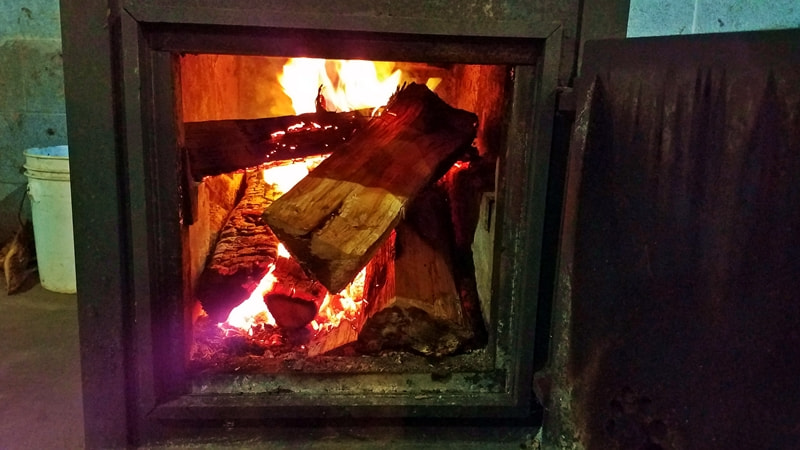 burning logs in a woodstove