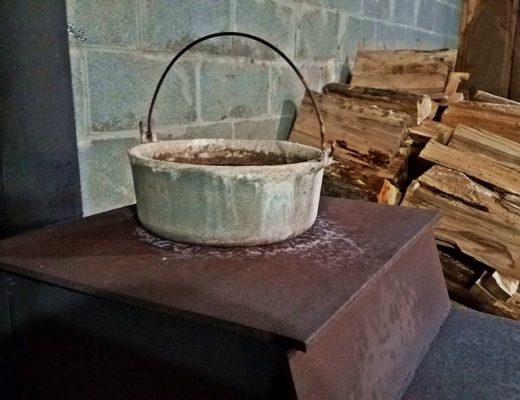 boiling pot of water on woodstove