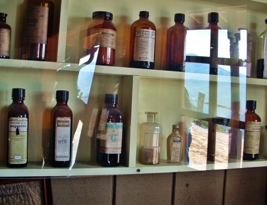 old medicine bottles on shelf