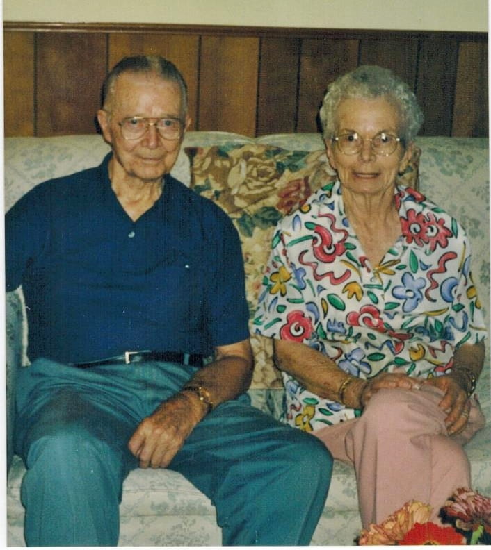 man and woman on couch