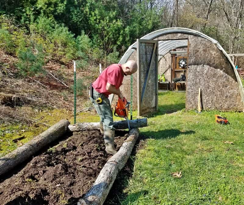 Man building raised bed