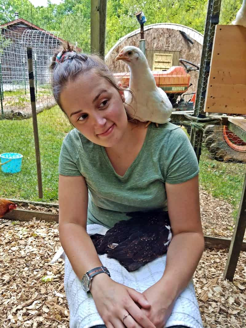 girl with chickens