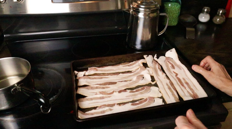 https://blindpigandtheacorn.com/wp-content/uploads/2021/05/cooking-bacon-in-the-oven.jpg