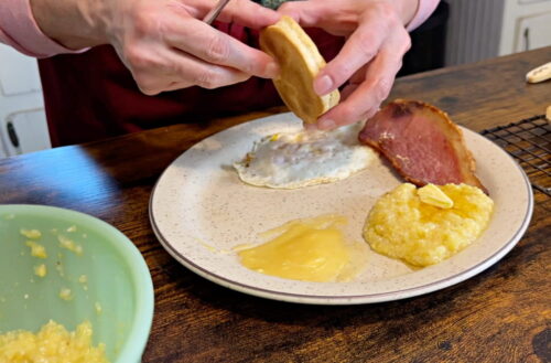 Plate of breakfast with grits