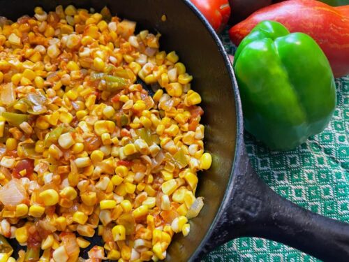corn cooked with tomatoes
