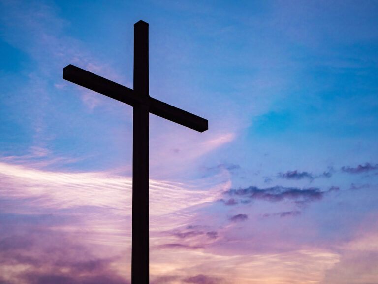 cross in blue sky