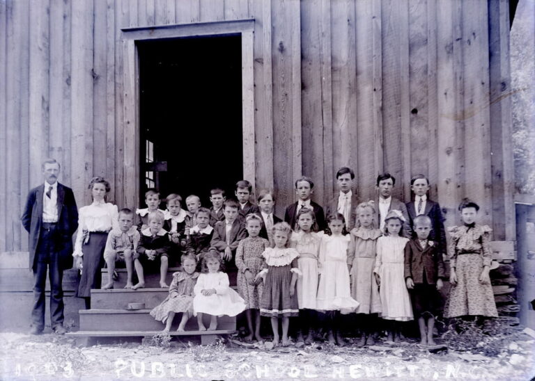 school children in front of old school