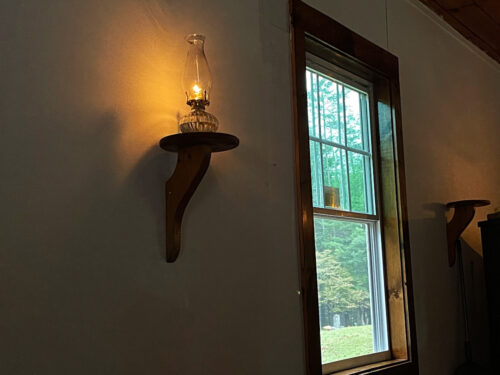oil lamp on wall