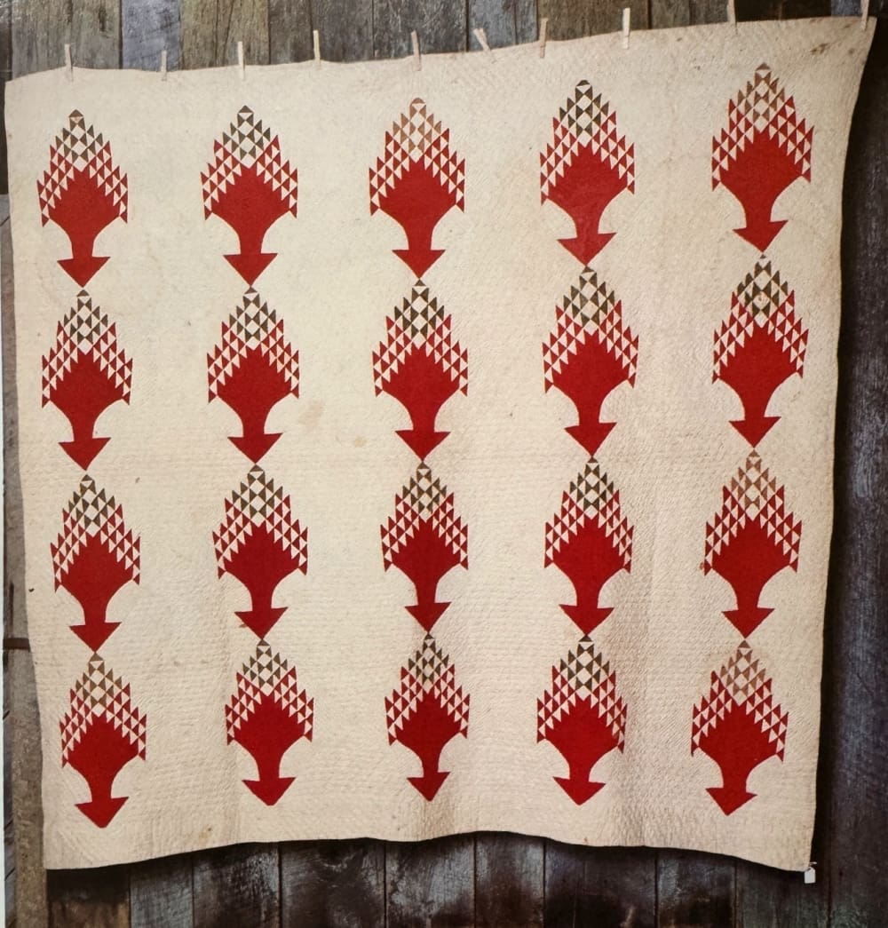 Quilt with red design