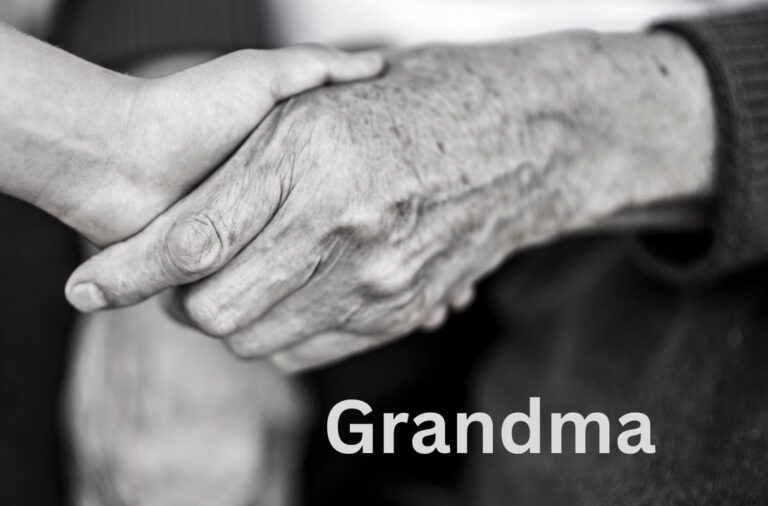 grandmother holding child's hand