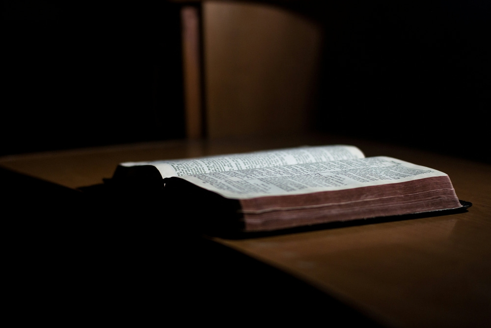 Bible open on desk