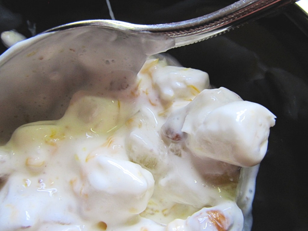 bowl of fruit salad with spoon