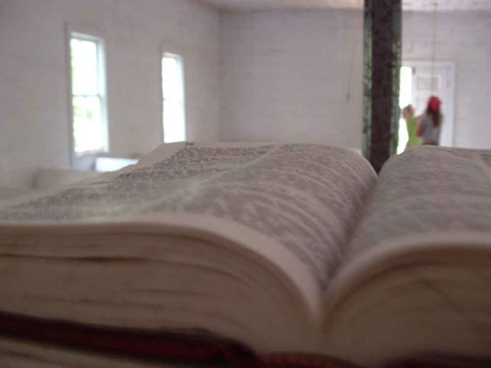 Bible open on pulpit