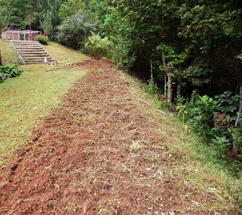 long freshly turned garden bed