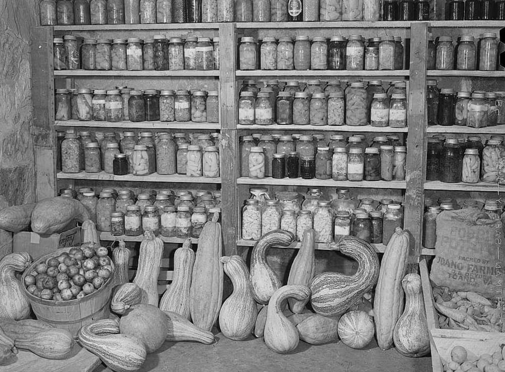 pantry with canned jars and winter squash