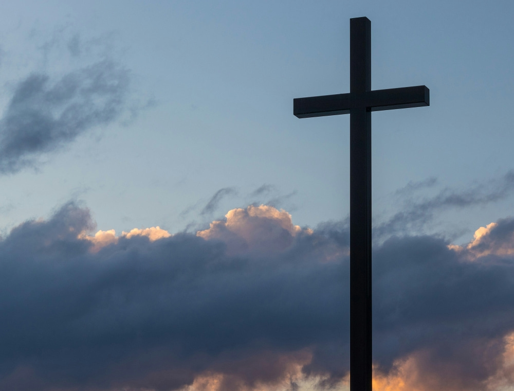 cross against dark sky