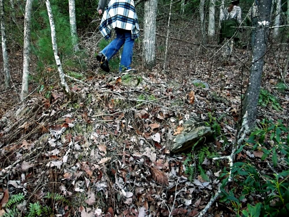 people hiking up mountain