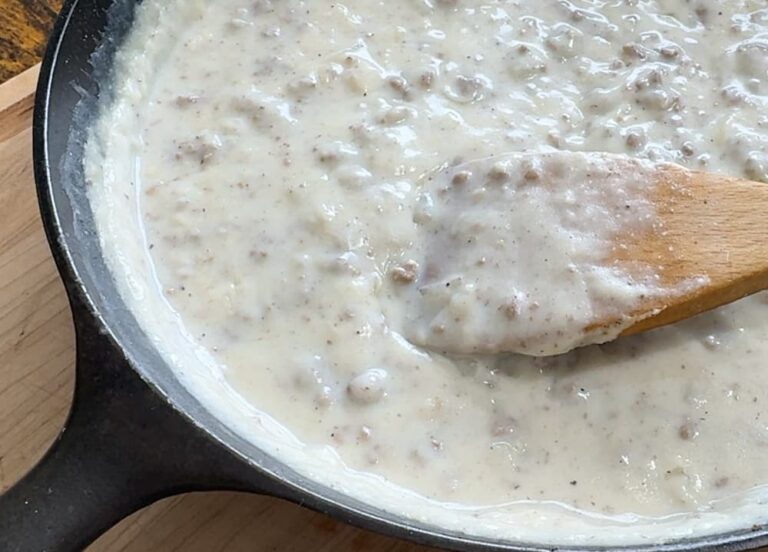 cast iron pan filled with hamburger gravy