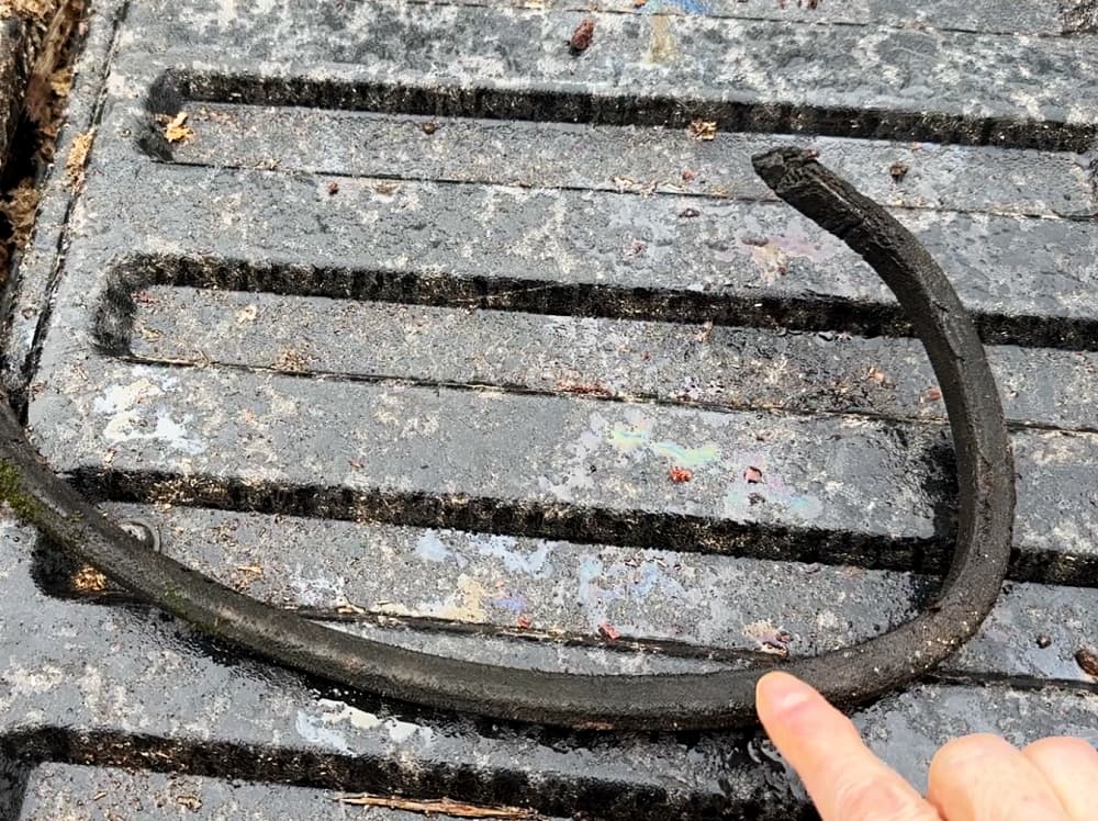 old belt laying on truck bed