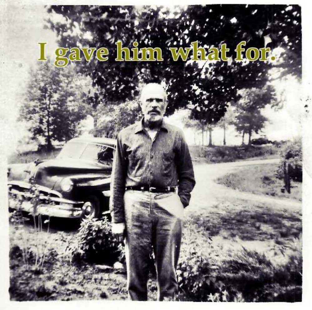 man by car