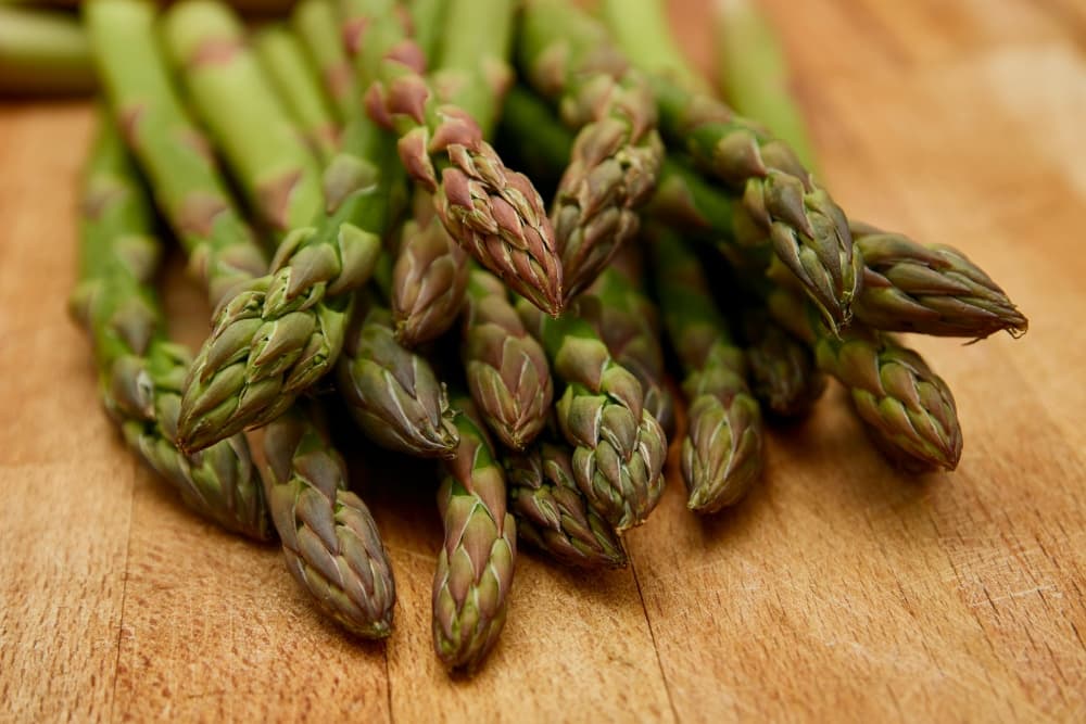 asparagus spears on cutting board