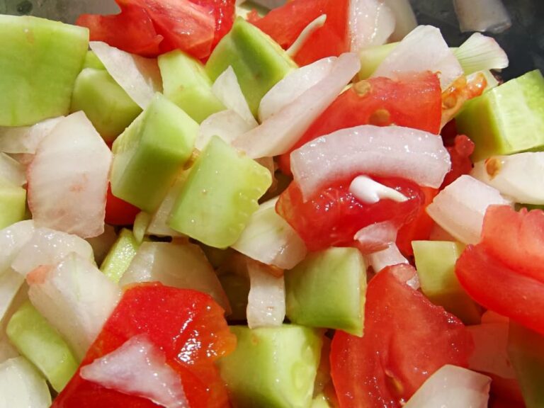 chopped cucumber tomato and onion