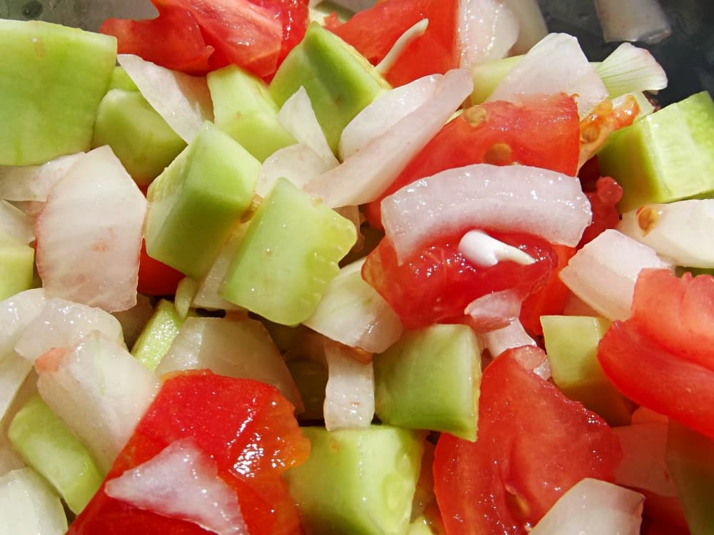 chopped cucumber tomato and onion