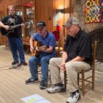 three men playing music