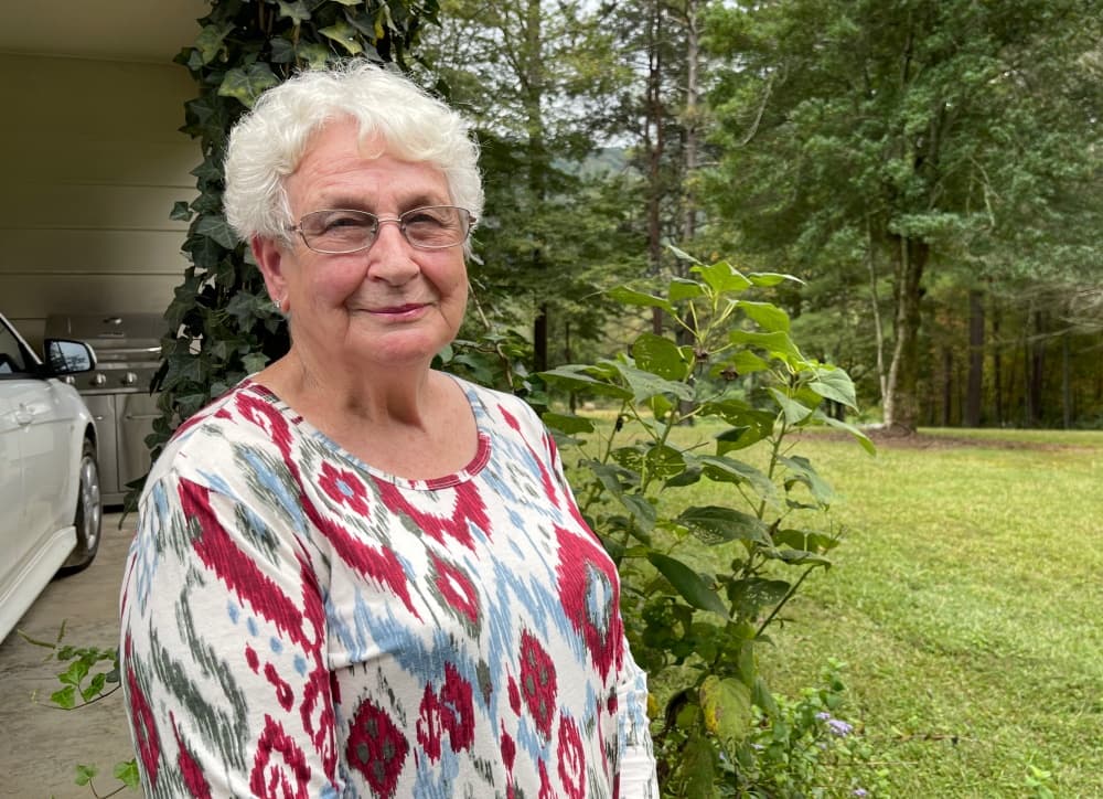 woman standing in yard