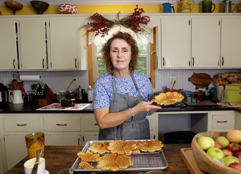 woman holding waffles