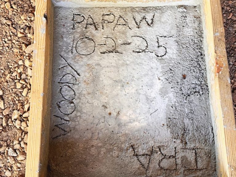 concrete with names written in it
