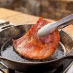 frying ham in pan