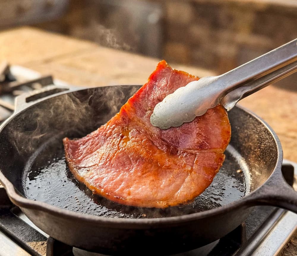 frying ham in pan