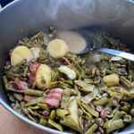 pot of new green beans and new potatoes cooked together
