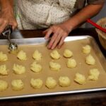 small mounds of minced garlic