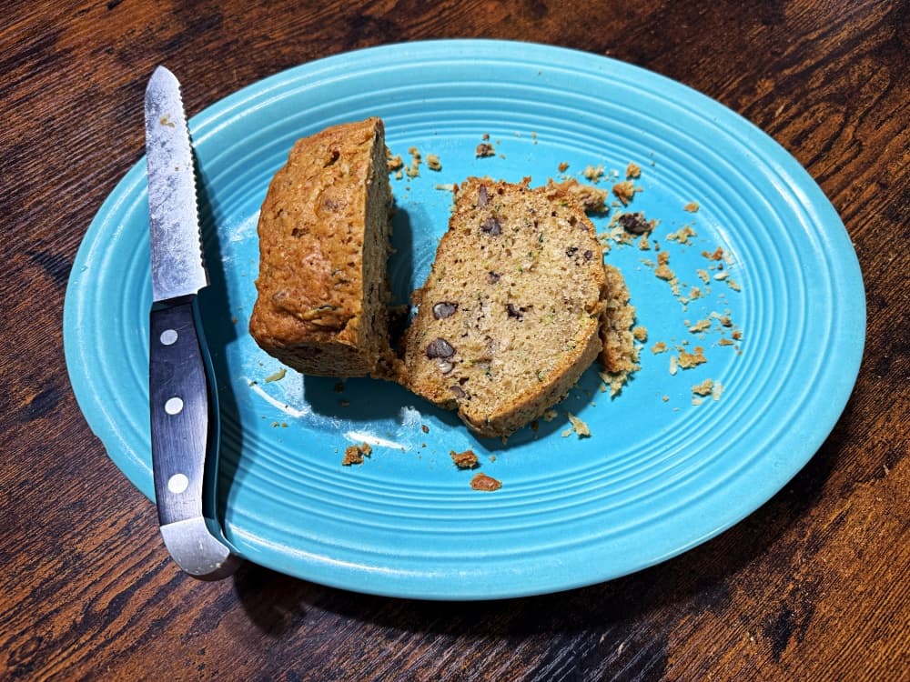 cut zucchini bread on plate