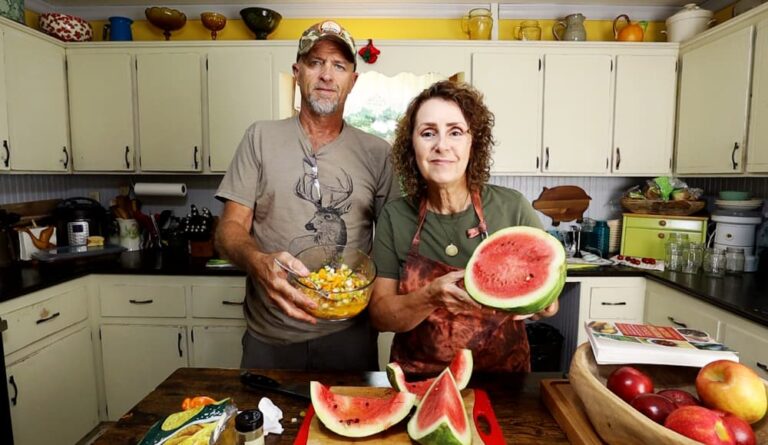 man and woman in kitchen